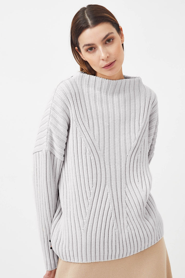 Minimalist luxury knitwear in light grey, crafted from sustainable materials