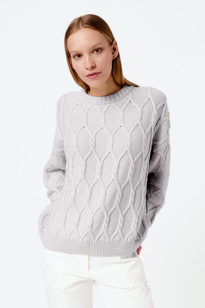 Knitted cable knit sweater