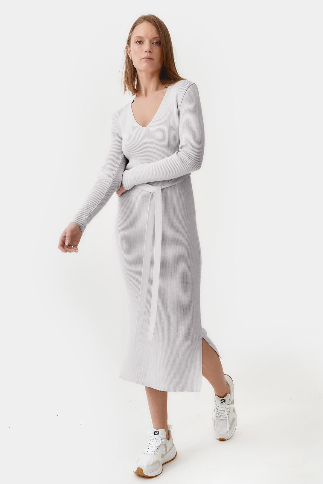 Knitted organic cotton maxi dress with V-neck in grey, featuring a soft, breathable fabric and a minimalist, full-length design for effortless elegance.