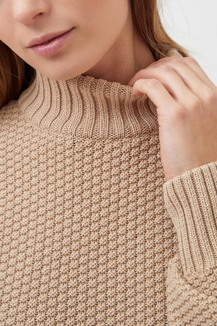 Oversized sand organic cotton pullover with rice cubes texture and high neck