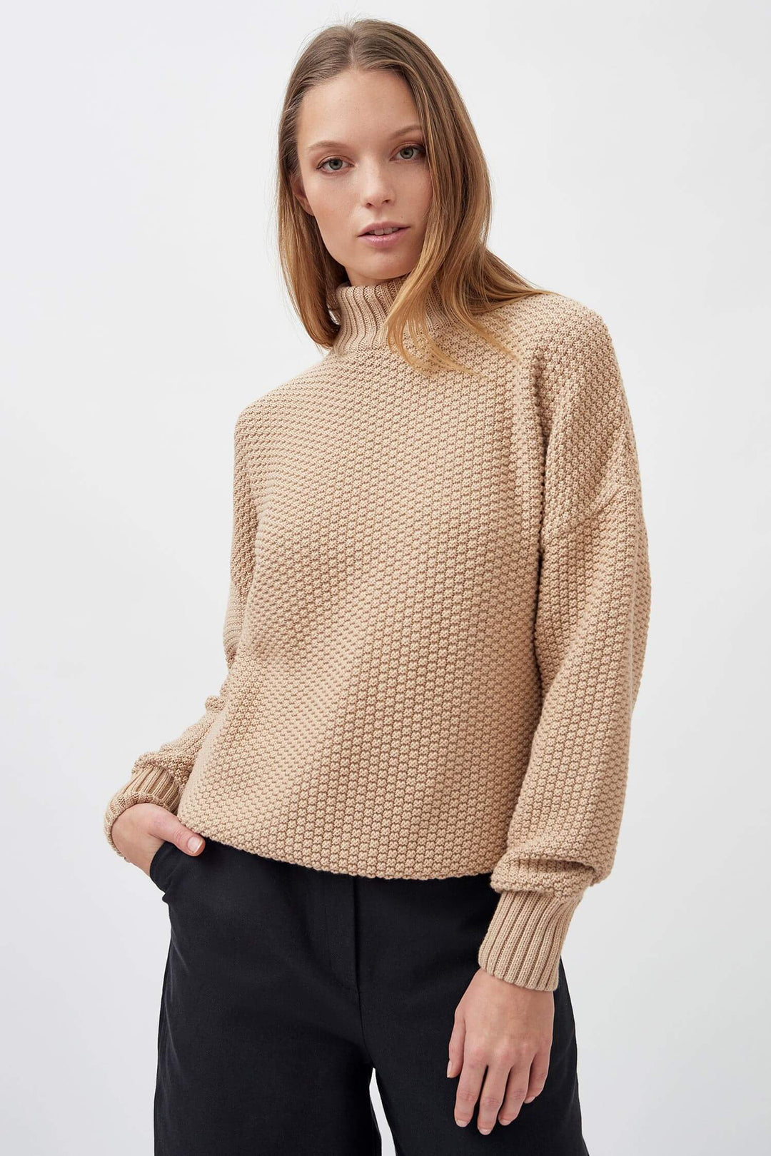 Chunky high neck knitted organic cotton rice cubes pullover in sand color